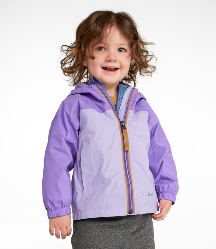 Child wearing purple colorblock rain jacket with hood and front zip