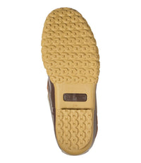 Bottom view of rubber moc shoe showing tan gum outsole tread pattern with brand logo