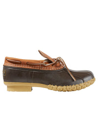 Low-cut rubber moc shoe with tan leather upper, lace detail, and textured gum outsole, side view