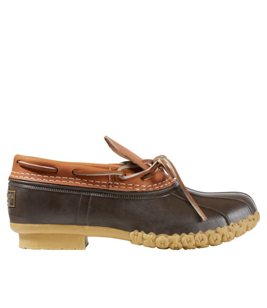 Low-cut rubber moc shoe with tan leather upper, lace detail, and textured gum outsole, side view