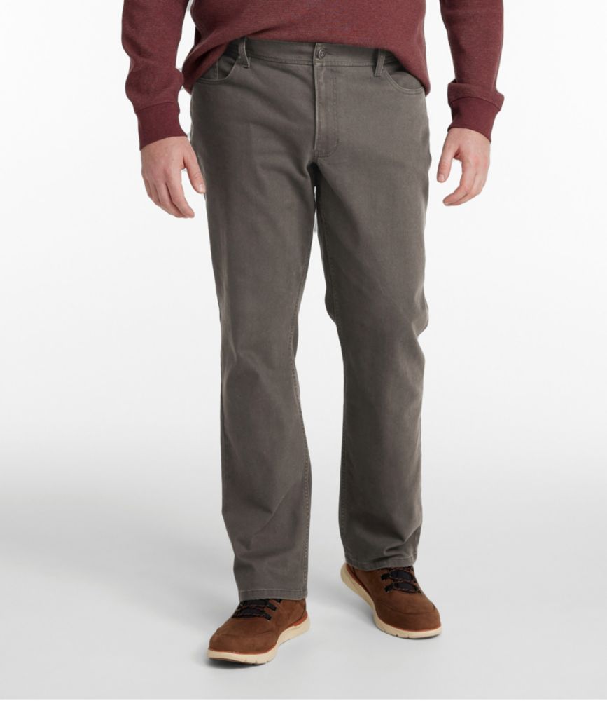Men's straight-leg five-pocket pants in dark ash gray, front view, worn with brown suede shoes
