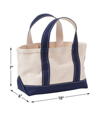 Small canvas tote bag with navy handles and base trim, shown with dimensions 10x6x7 inches