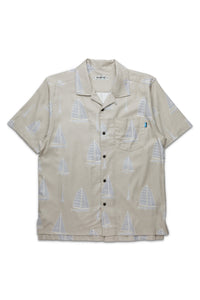 Light tan button-up shirt with white sailboat print pattern and chest pocket