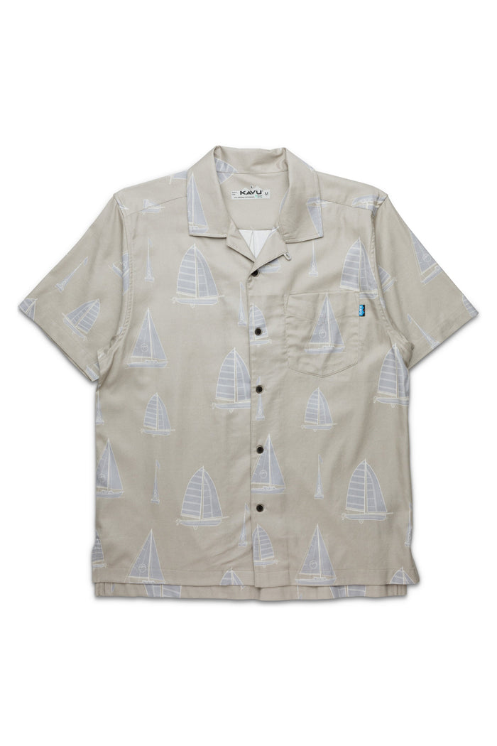 Light tan button-up shirt with white sailboat print pattern and chest pocket