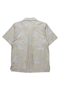 Short-sleeve button-up shirt with sailboat print pattern, back view on white background