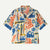 Short-sleeve button-up shirt with surfboard and wave print pattern on cream background