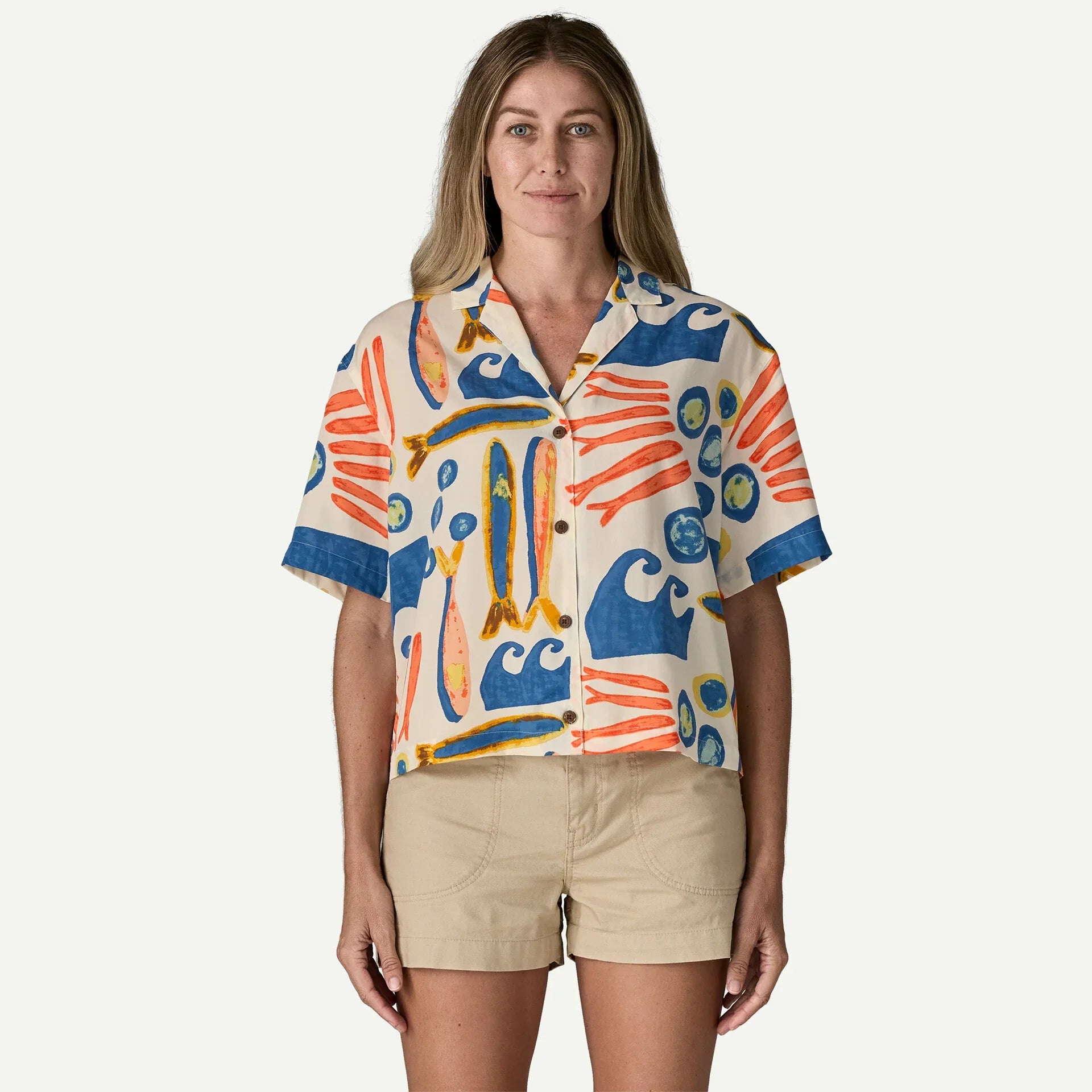 Short-sleeve button-up shirt with ocean-themed print in coral and blue tones, front view