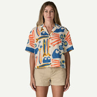 Short-sleeve button-up shirt with ocean-themed print in coral and blue tones, front view