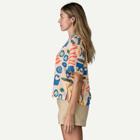 Short-sleeve button-up shirt with colorful abstract seafood pattern, side profile view