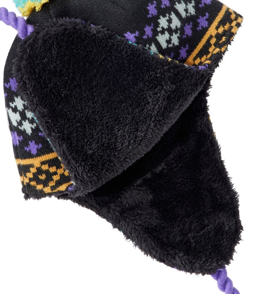 Kids' earflap winter hat with Fair Isle knit pattern and plush black fleece lining, detail view