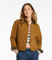 Brown field jacket with button front, chest and hip pockets, worn open over striped shirt