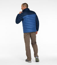 Men's puffer jacket back view, two-tone blue quilted design, worn with khaki pants