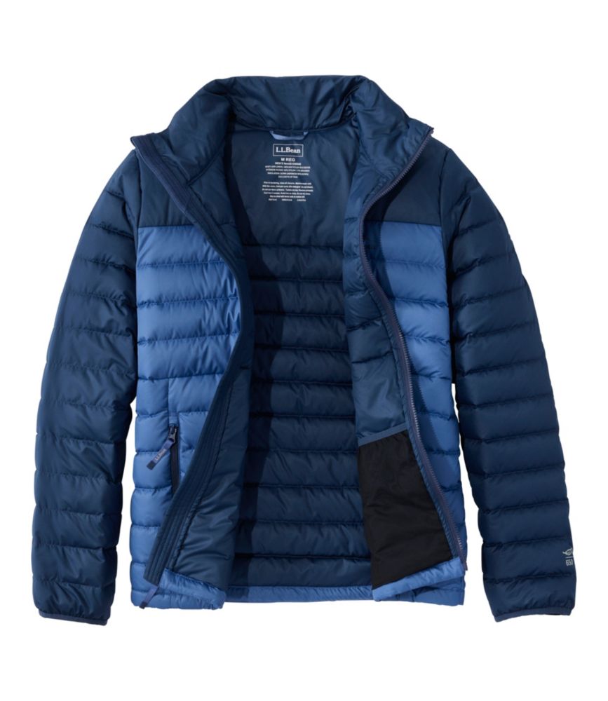 Men's quilted puffer jacket in two-tone navy blue, open front view showing interior lining