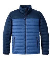 Men's quilted puffer jacket with two-tone navy colorblock design, stand collar, and zip pockets