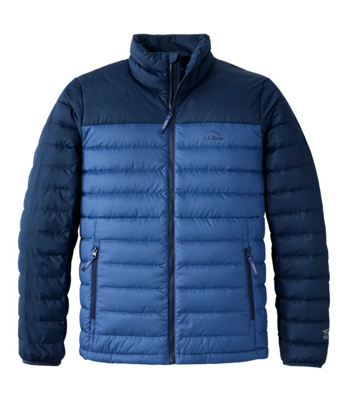 Men's quilted puffer jacket with two-tone navy colorblock design, stand collar, and zip pockets