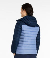 Women's quilted puffer jacket with hood, two-tone navy and light blue colorblock design, back view