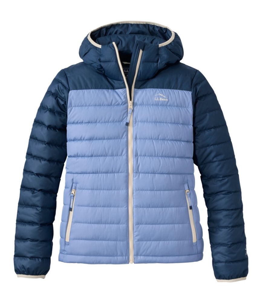 Women's hooded puffer jacket with two-tone blue colorblock design, front zip closure, and side zip pockets
