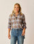 Women's plaid flannel button-up shirt with rolled cuffs, worn with blue jeans, front view