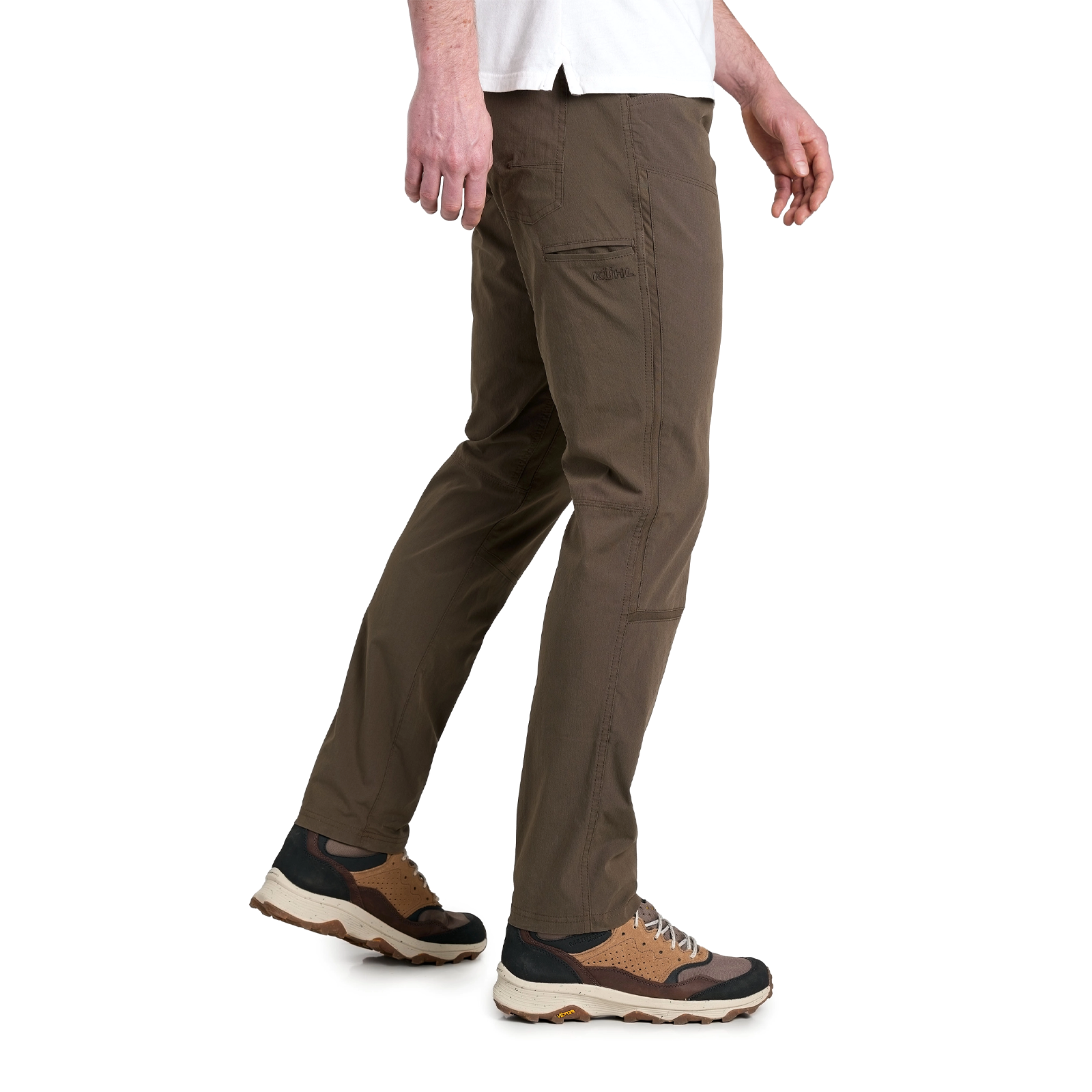 Men's slim-fit olive hiking pants with side pocket, worn with trail shoes, side view