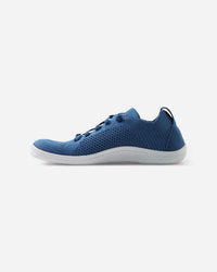 Blue knit barefoot shoe with perforated upper and white sole, side view