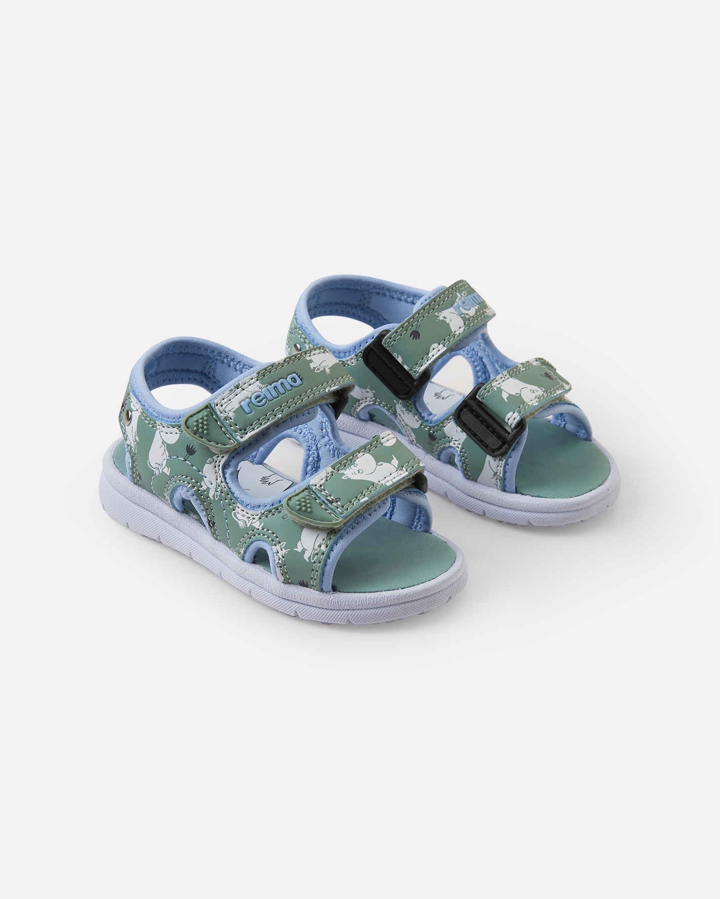 Children's sandals with cartoon character print, velcro straps and light blue trim on white background