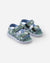 Children's sandals with cartoon character print, velcro straps and light blue trim on white background