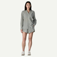Gray striped button-down shirt and matching shorts set on model, front view