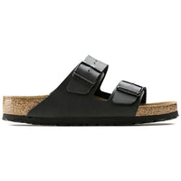 Black two-strap sandal with adjustable buckles and cork footbed, side view