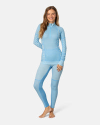 Women's light blue patterned half-zip base layer top with matching leggings, front view