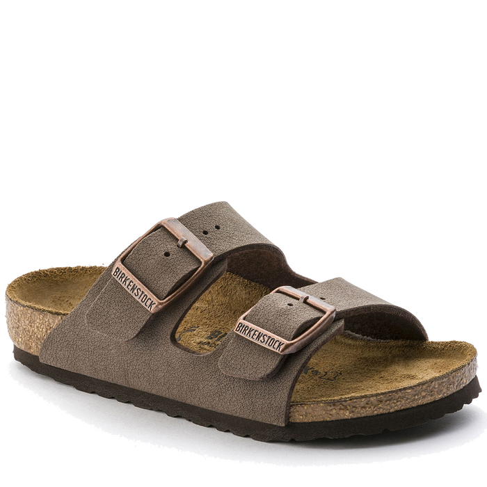 Brown suede two-strap sandals with buckles and cork footbed, side angle view