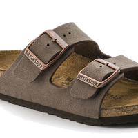 Brown suede two-strap sandals with adjustable buckles on white background