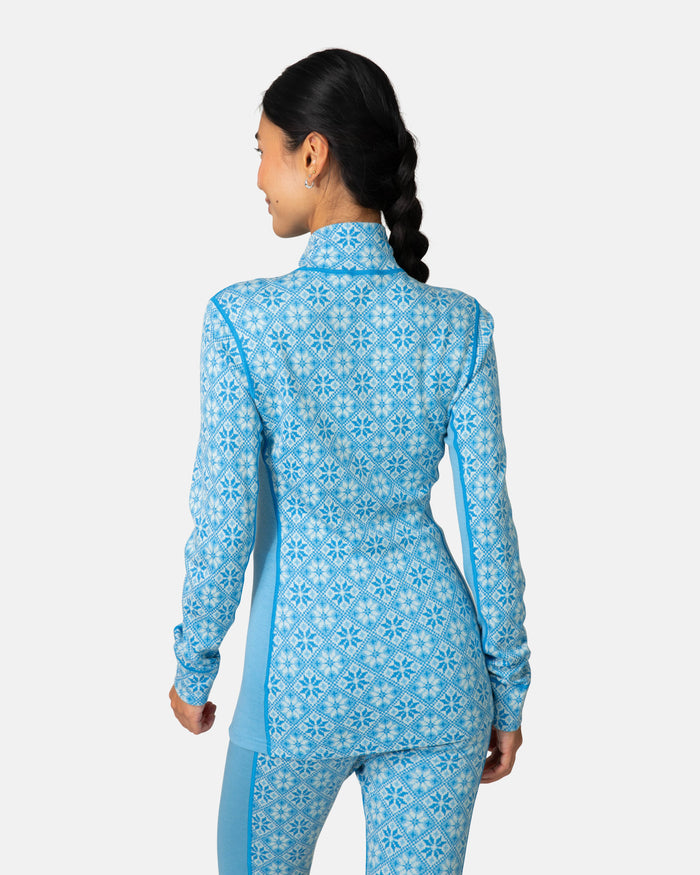 Women's half-zip base layer top with Nordic snowflake print, back view on model