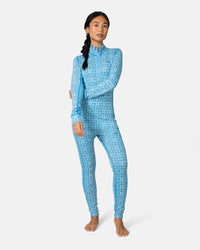 Women's blue Nordic-patterned half-zip base layer top and matching leggings, front view