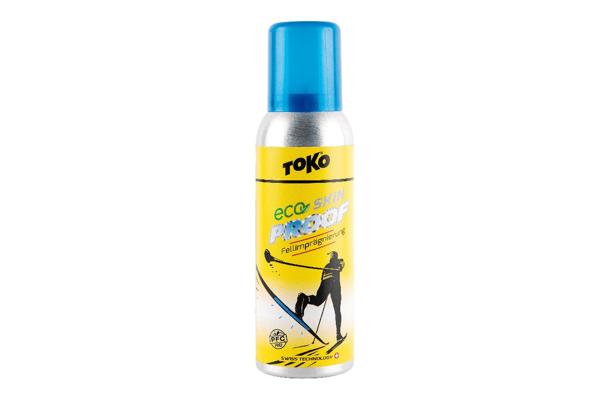 Ski care spray bottle with yellow label and blue cap, front product view