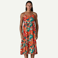 Sleeveless midi dress with tropical floral print featuring tiered ruffles at hem