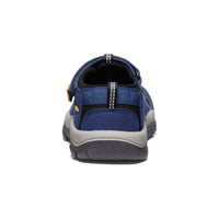 Navy blue water sandal with yellow accents, rear heel view showing adjustable strap