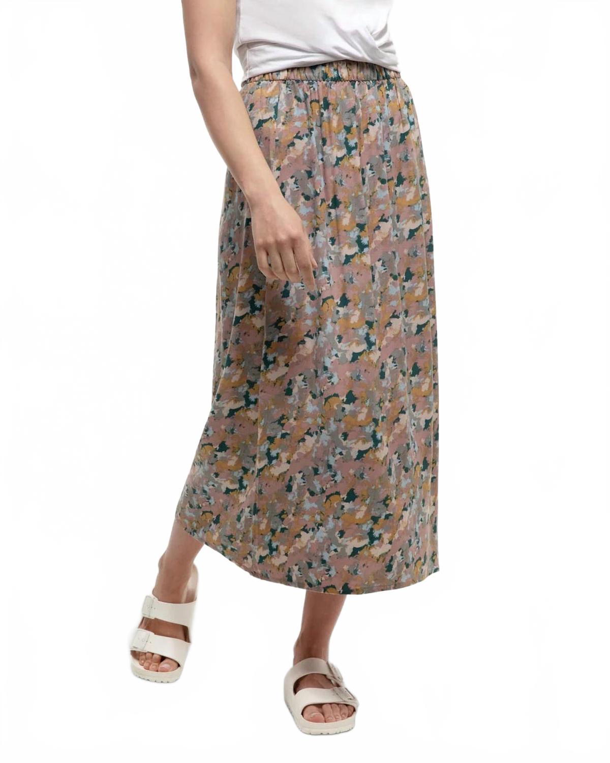 Long midi skirt with elastic waistband featuring abstract floral print in muted tones