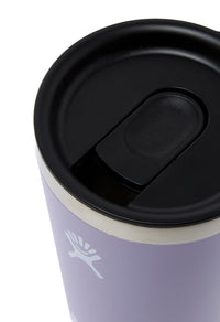 Close-up of insulated tumbler top with black slide-lock lid and brand logo on lavender body