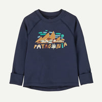 Children's dark navy long-sleeve crew neck base layer with mountain and foliage graphic print