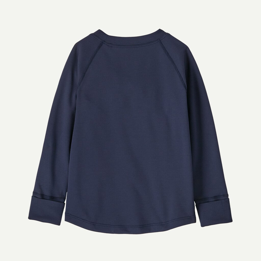 Dark navy long-sleeve crew neck top with textured fabric, back view showing raglan seams