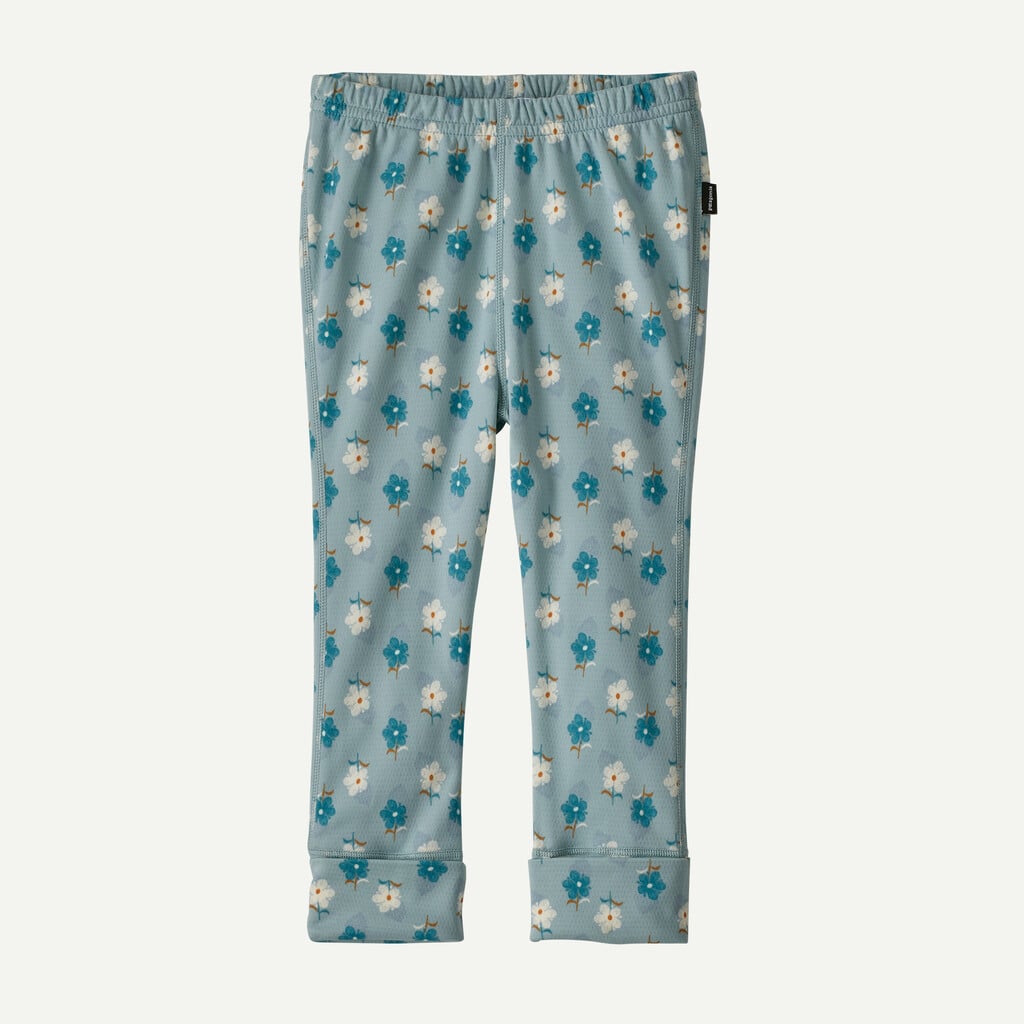 Baby leggings with elastic waistband featuring blue and white floral ditsy print, front view