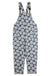 Blue overalls with white daisy floral pattern and adjustable straps, front view