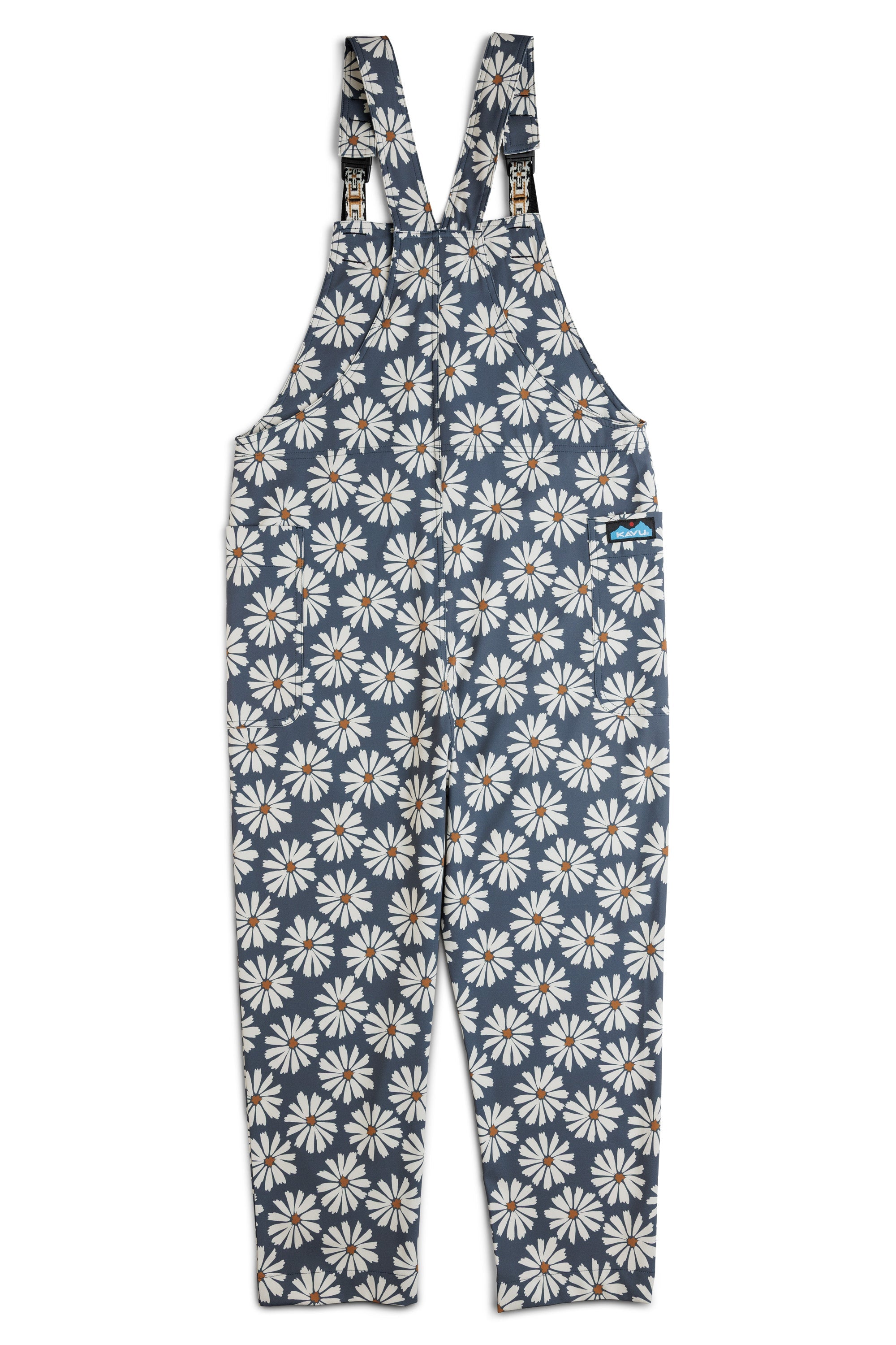 Blue overalls with white daisy floral pattern, adjustable straps and chest pocket