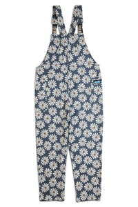 Blue overalls with white daisy floral pattern, adjustable straps and chest pocket