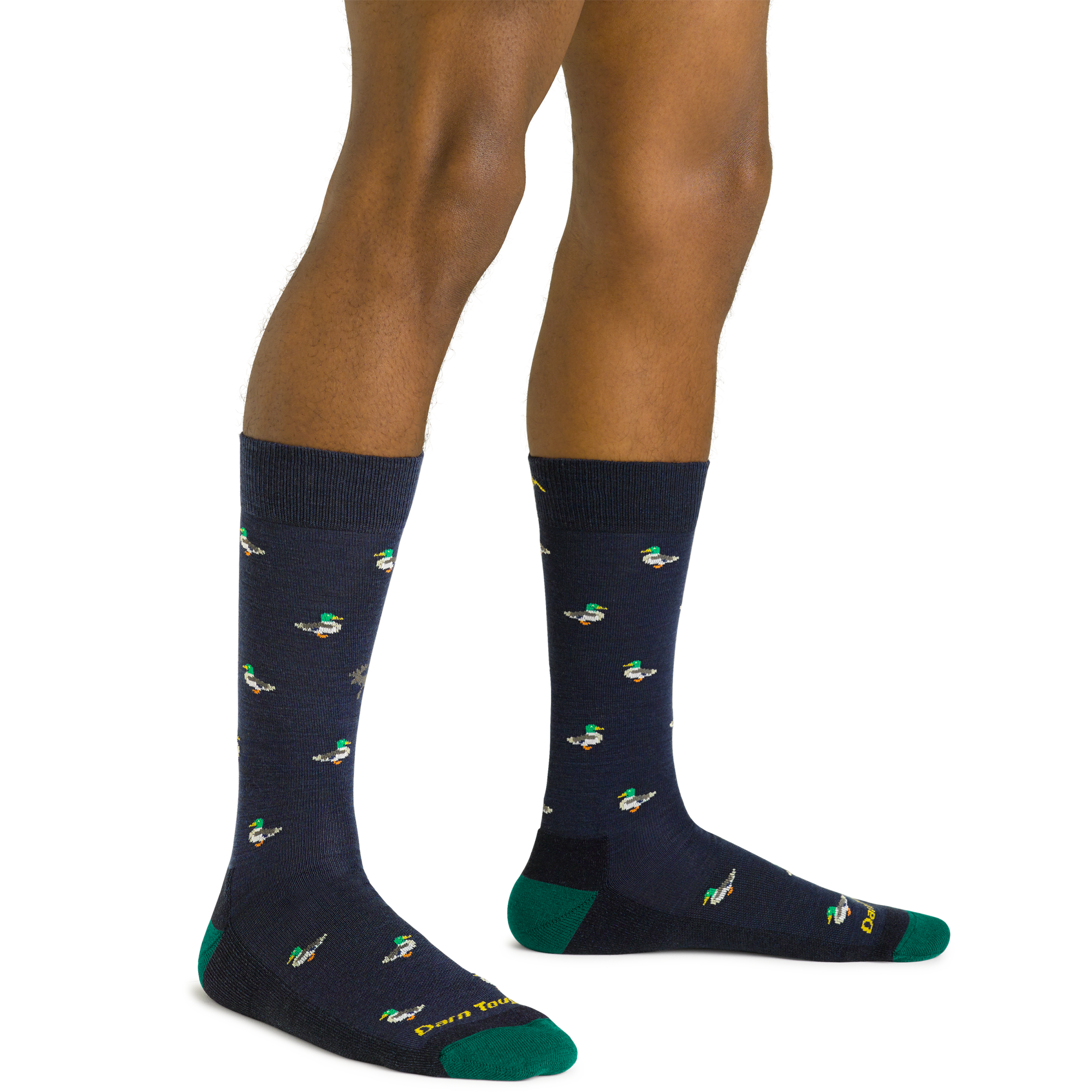 Navy crew socks with mallard duck print and green heel and toe, on-model front view