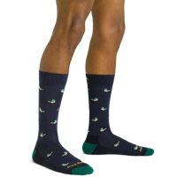 Navy crew socks with mallard duck print and green heel and toe, on-model front view