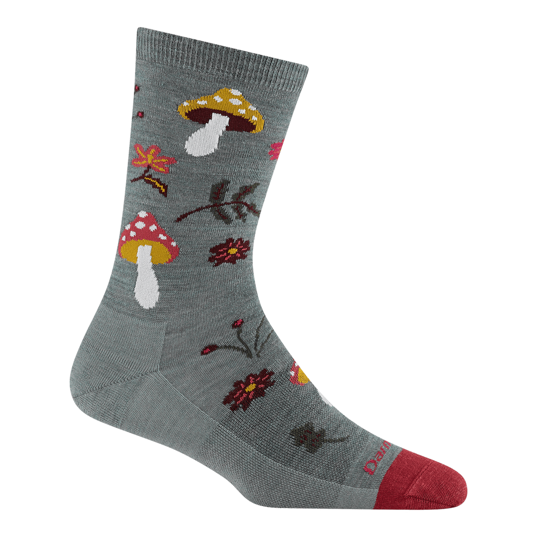 Sage green crew sock with mushroom and floral pattern, red toe, side view