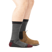 Striped crew socks in charcoal gray with burgundy heel and toe, worn with brown Chelsea boot