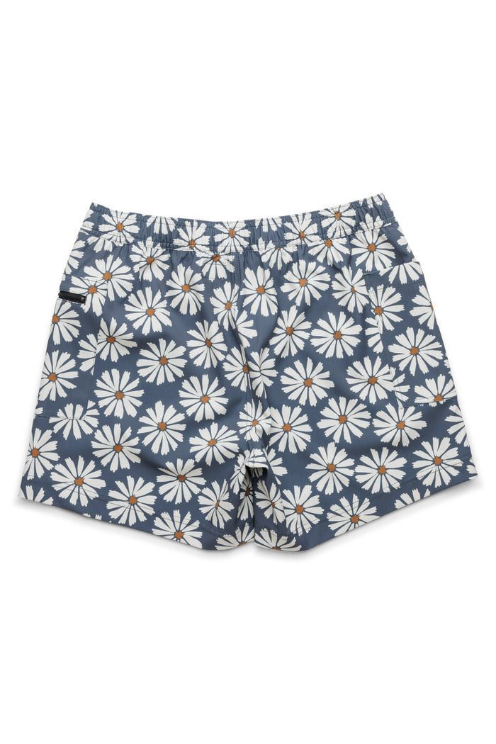 Women's shorts with blue background and white daisy floral print, flat lay view