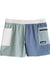 Colorblock athletic shorts with mint green, blue-gray and white panels, elastic waistband and zippered pocket